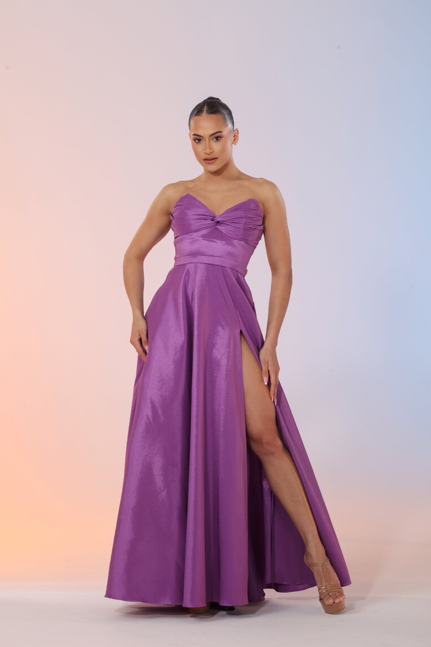Victoria strapless taffeta knot bodice gown with high side slit and pockets