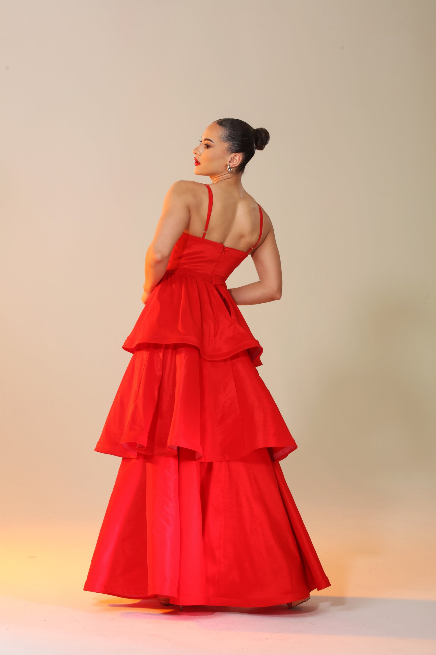 Cascading ruffle layered taffeta gown