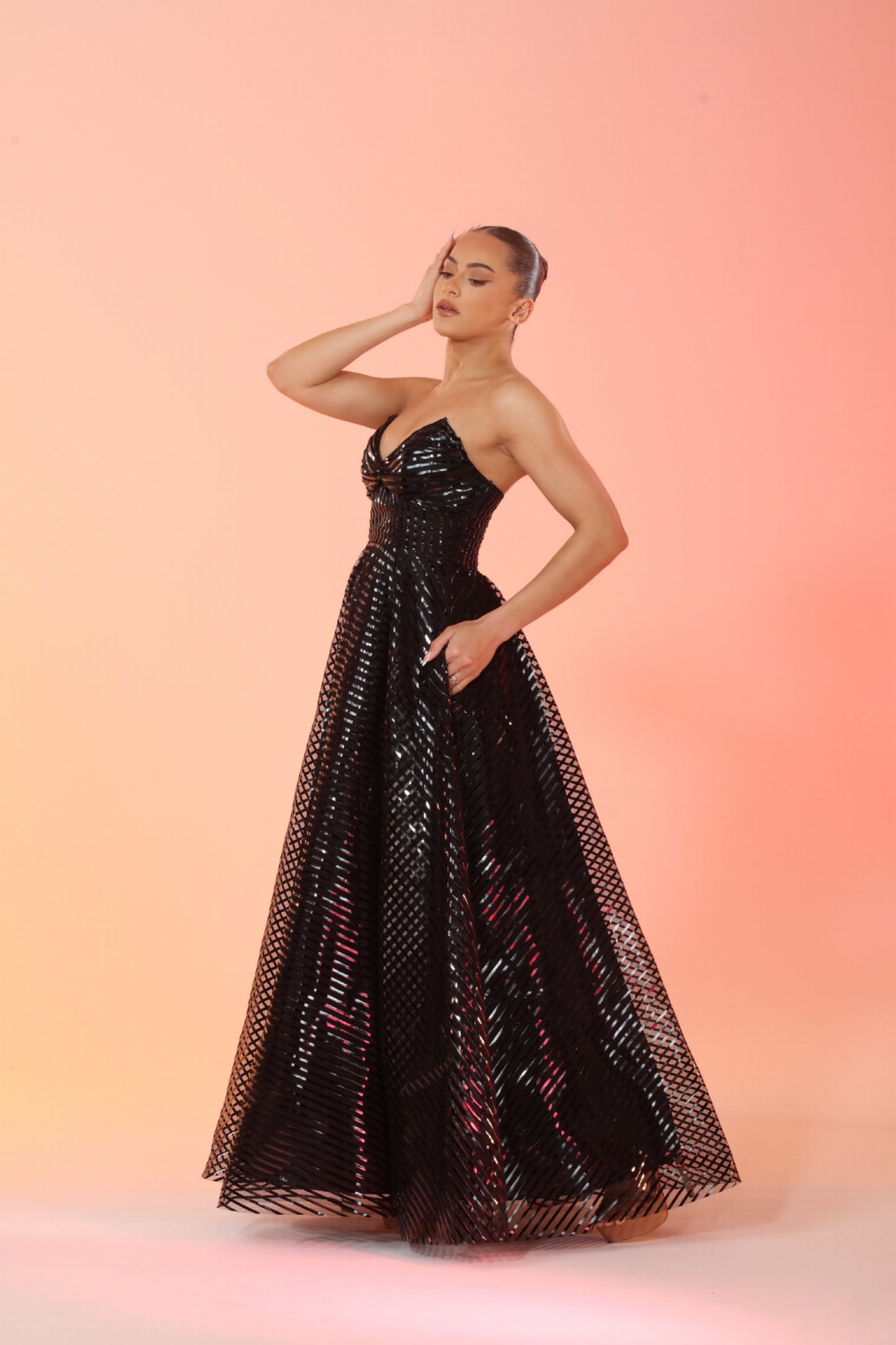 Gabriella black strapless knot front ballgown with pockets