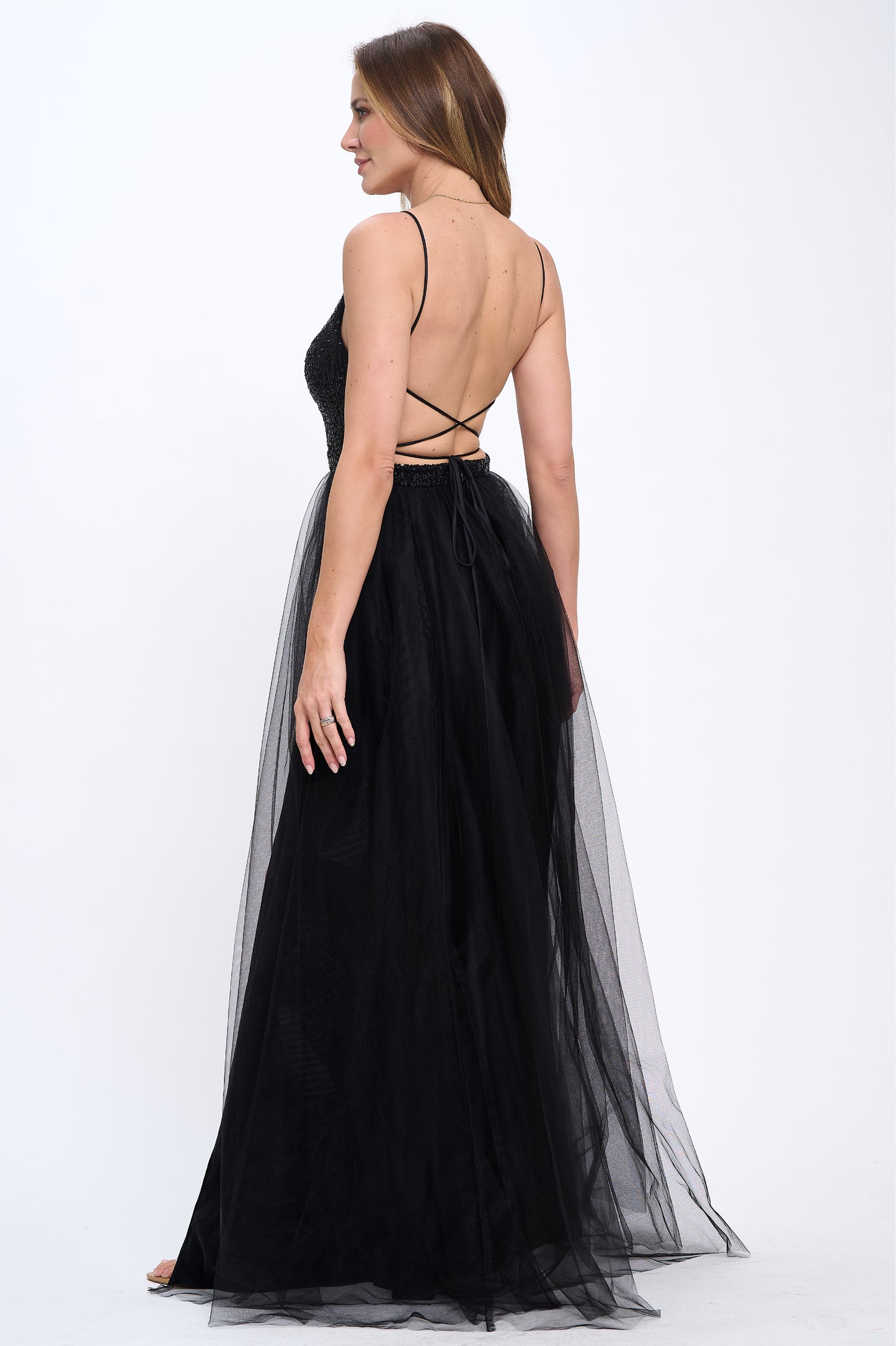 Sequin and tulle side slit tie back gown