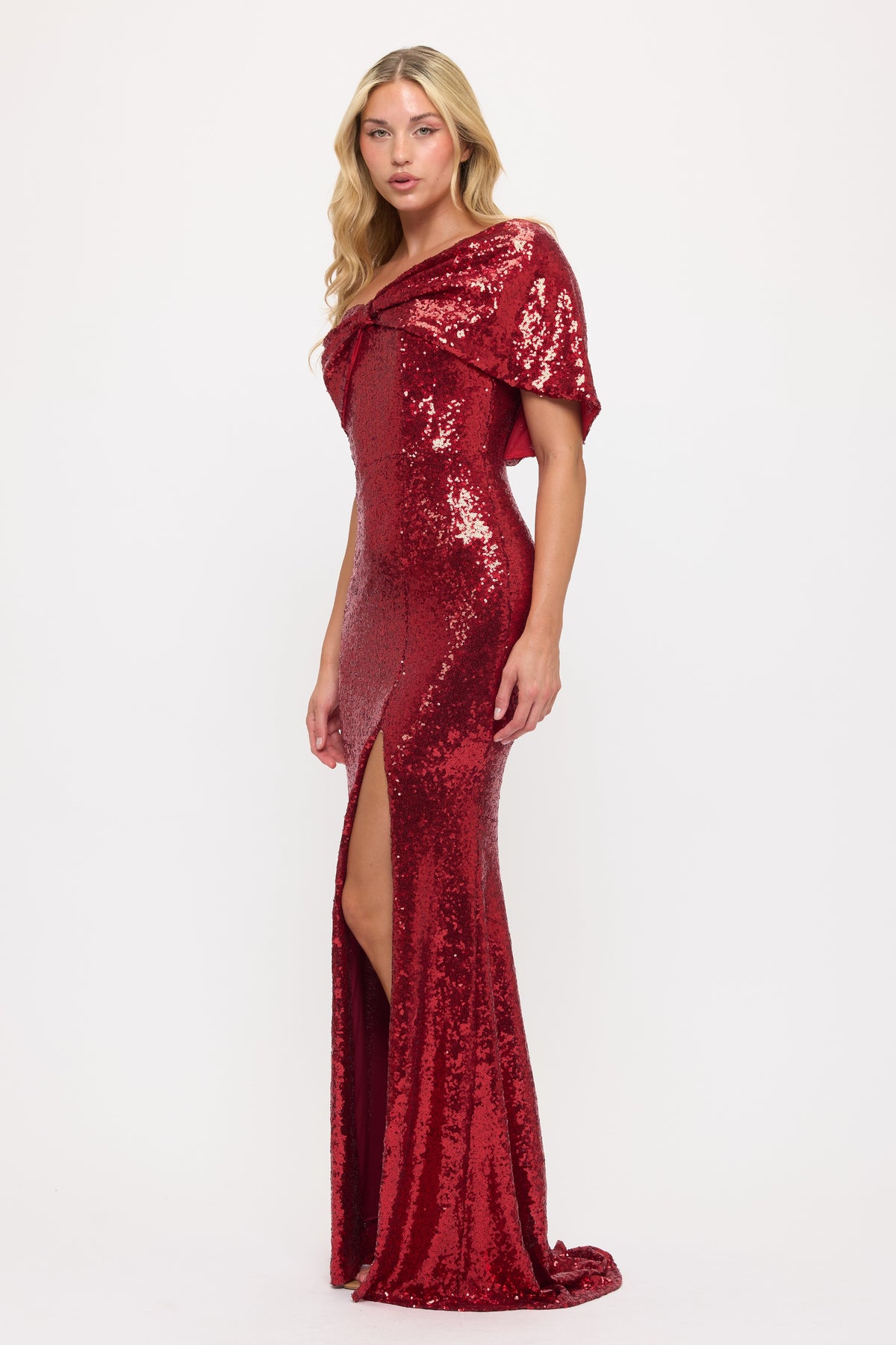 Sparkling sequin one shoulder bow side slit gown