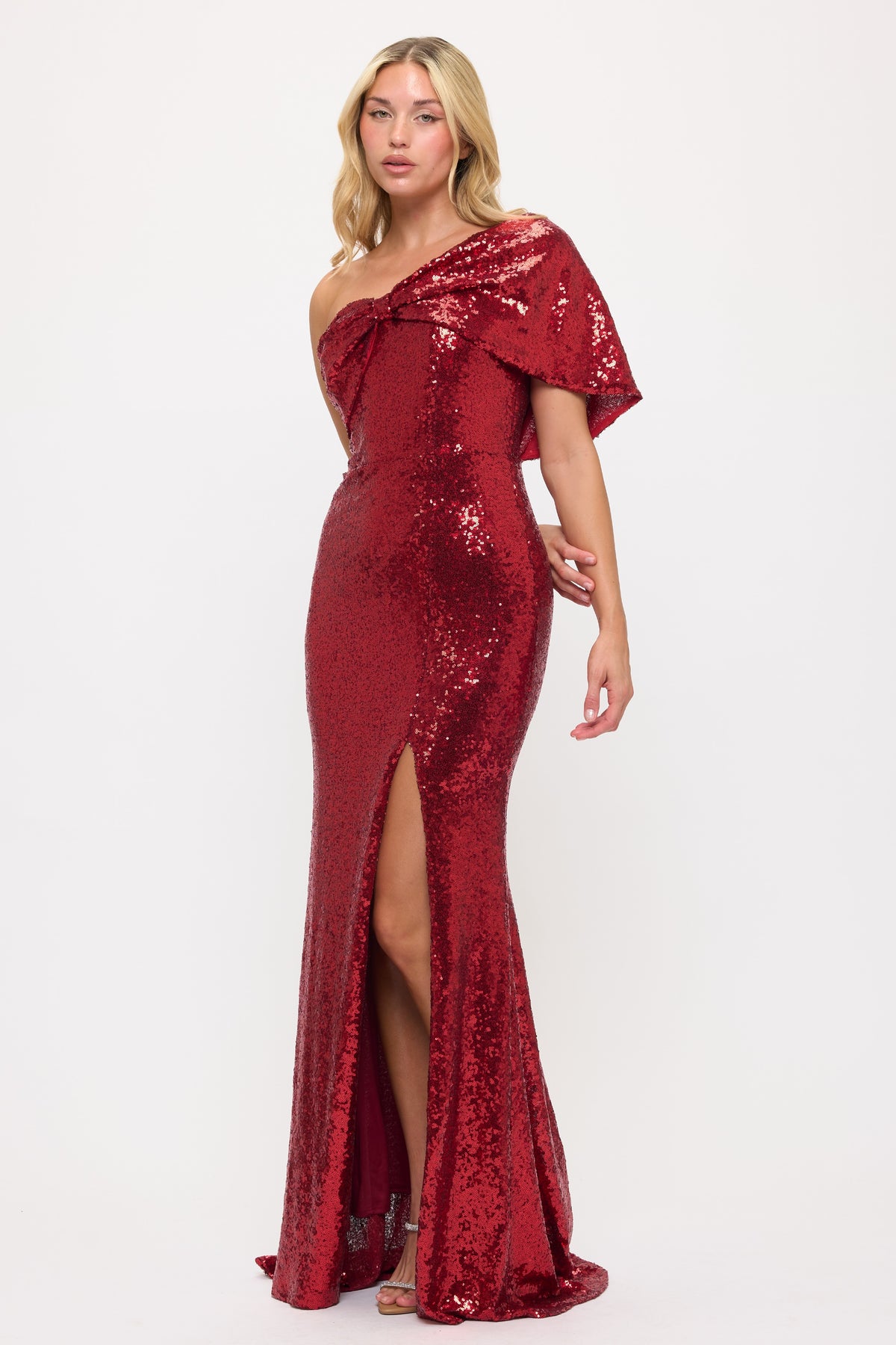 Sparkling sequin one shoulder bow side slit gown