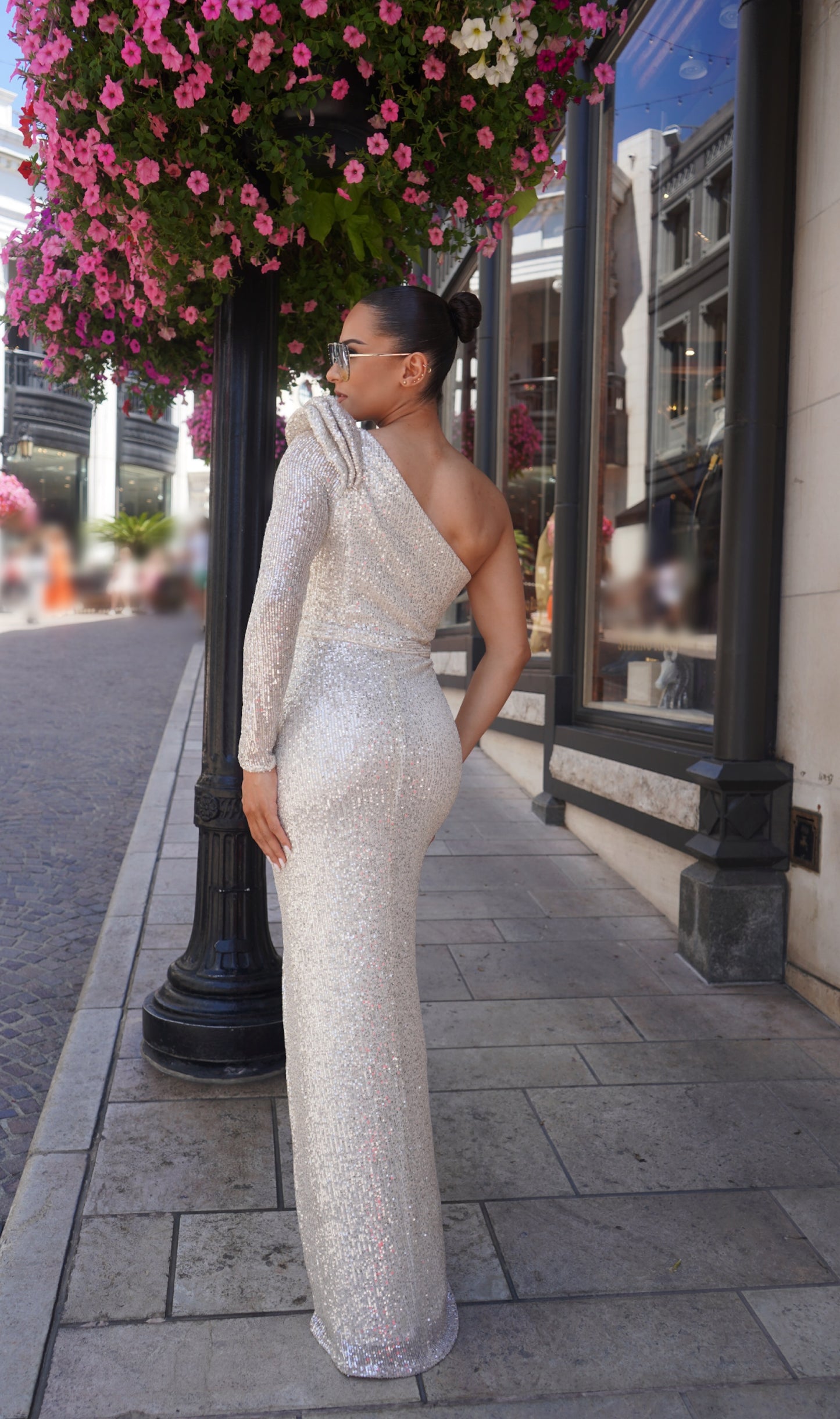 Alluring one shoulder sequin slit gown