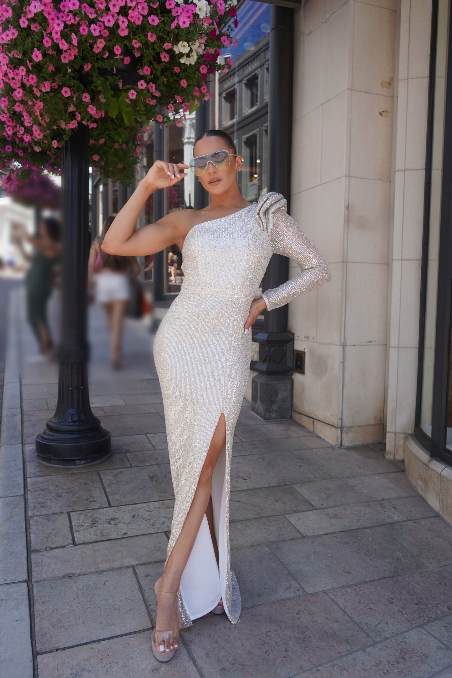 Alluring one shoulder sequin slit gown