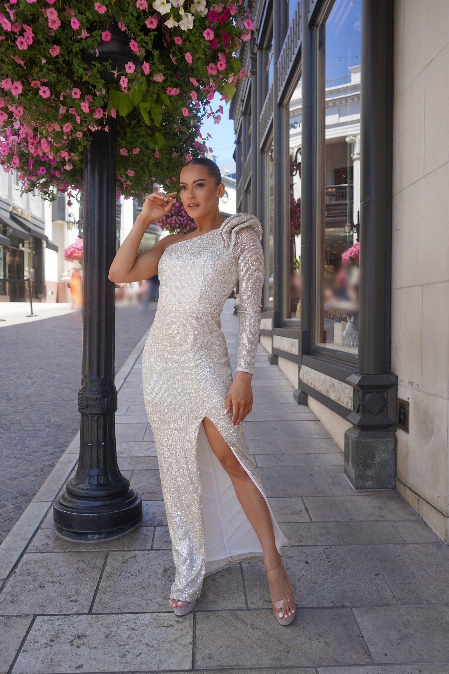 Alluring one shoulder sequin slit gown