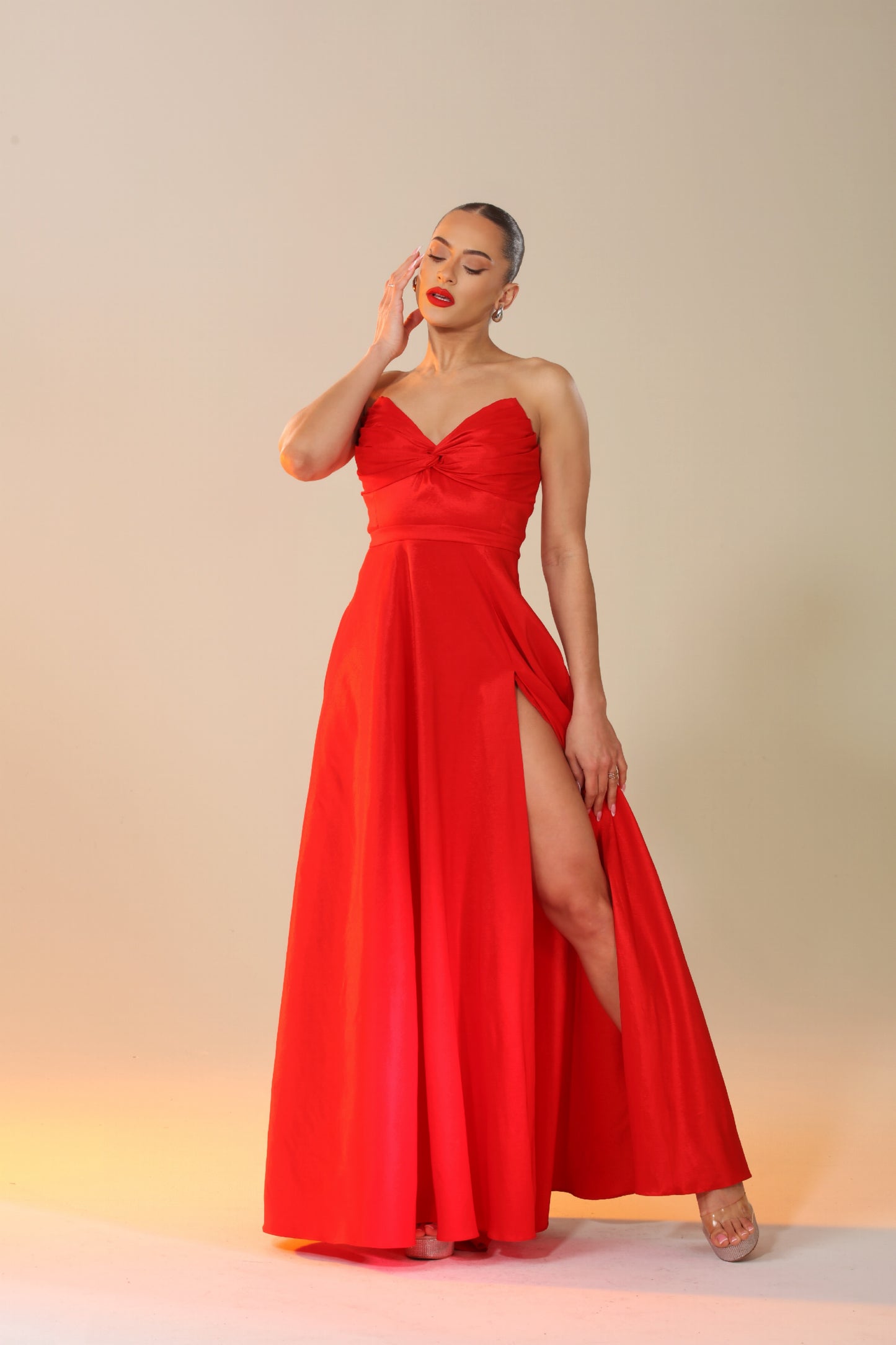 Victoria strapless taffeta knot bodice gown with high side slit and pockets