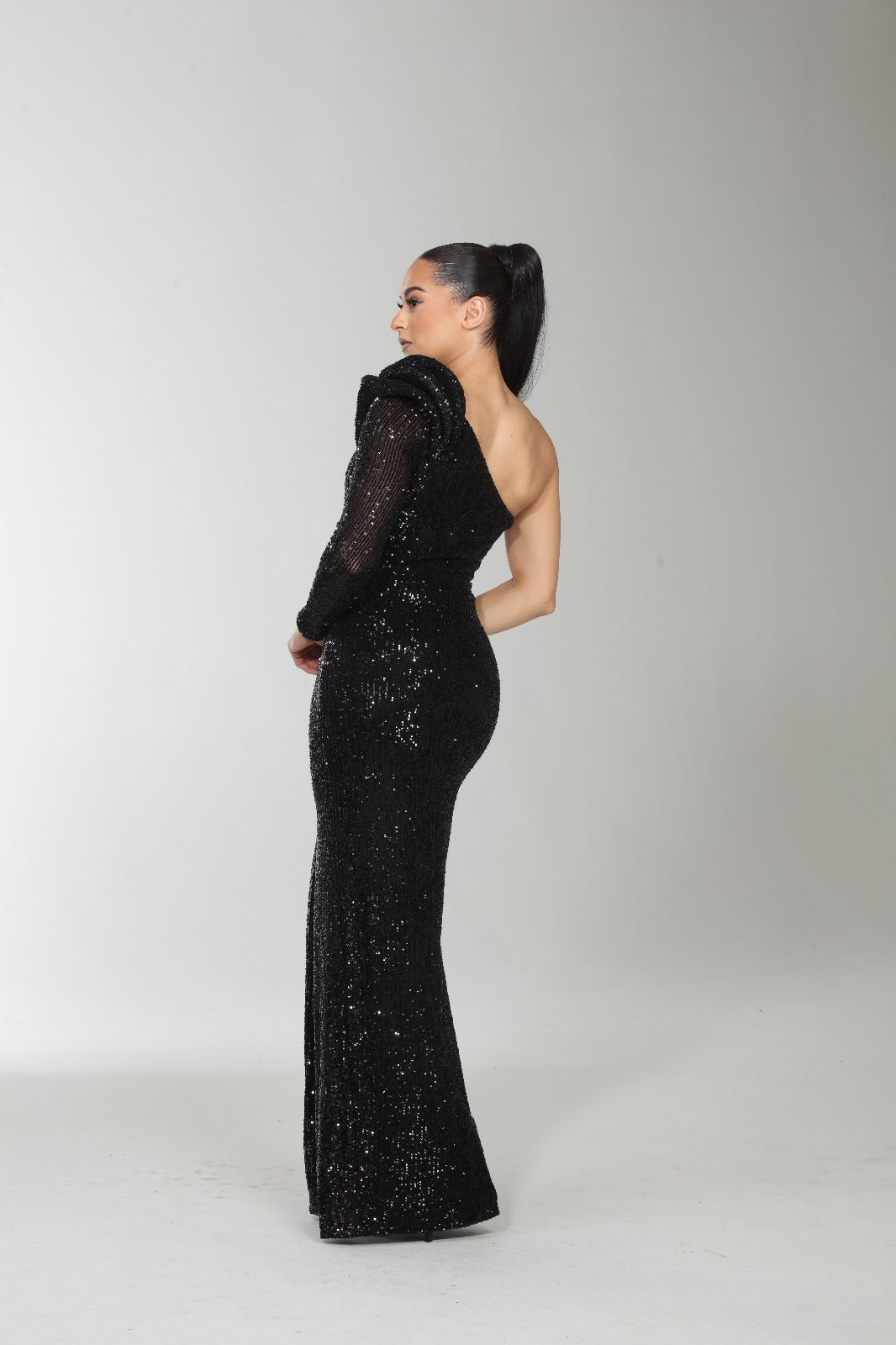 Alluring one shoulder sequin slit gown