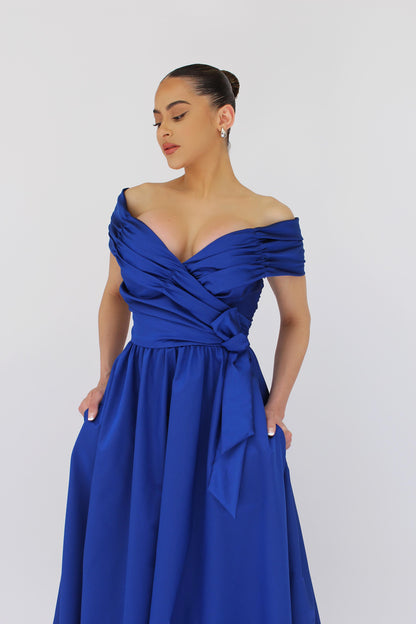 Behold the perfect off the shoulder gown