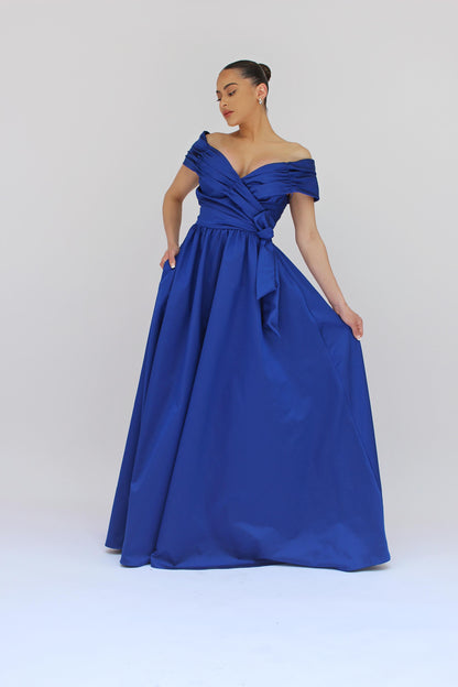 Behold the perfect off the shoulder gown