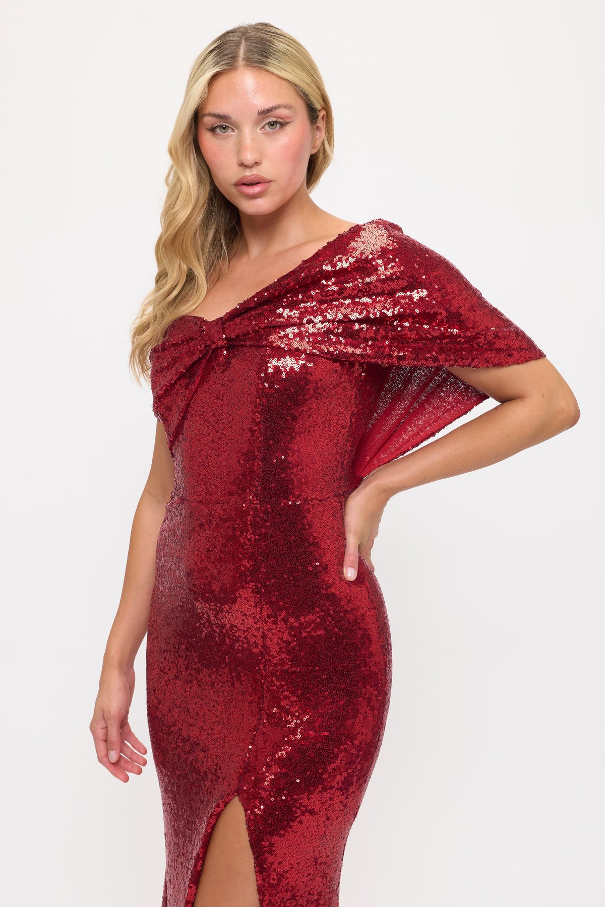 Sparkling sequin one shoulder bow side slit gown