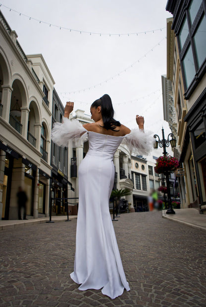 Off shoulder ruffle tulle sleeve mermaid gown