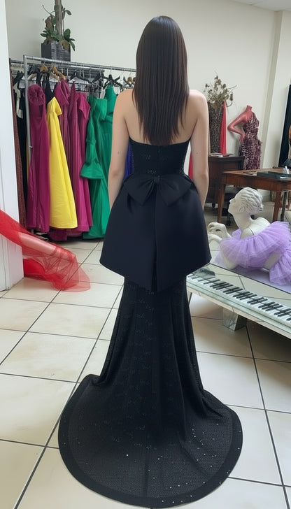 Strapless lace and sequin gown with taffeta  peplum bow detail gown