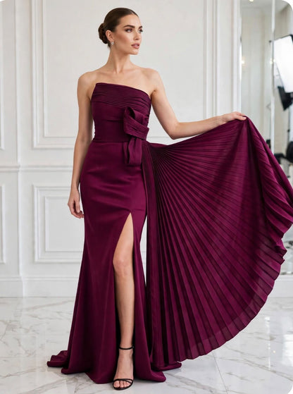 Strapless pleated bow taffeta asymmetrical slit gown