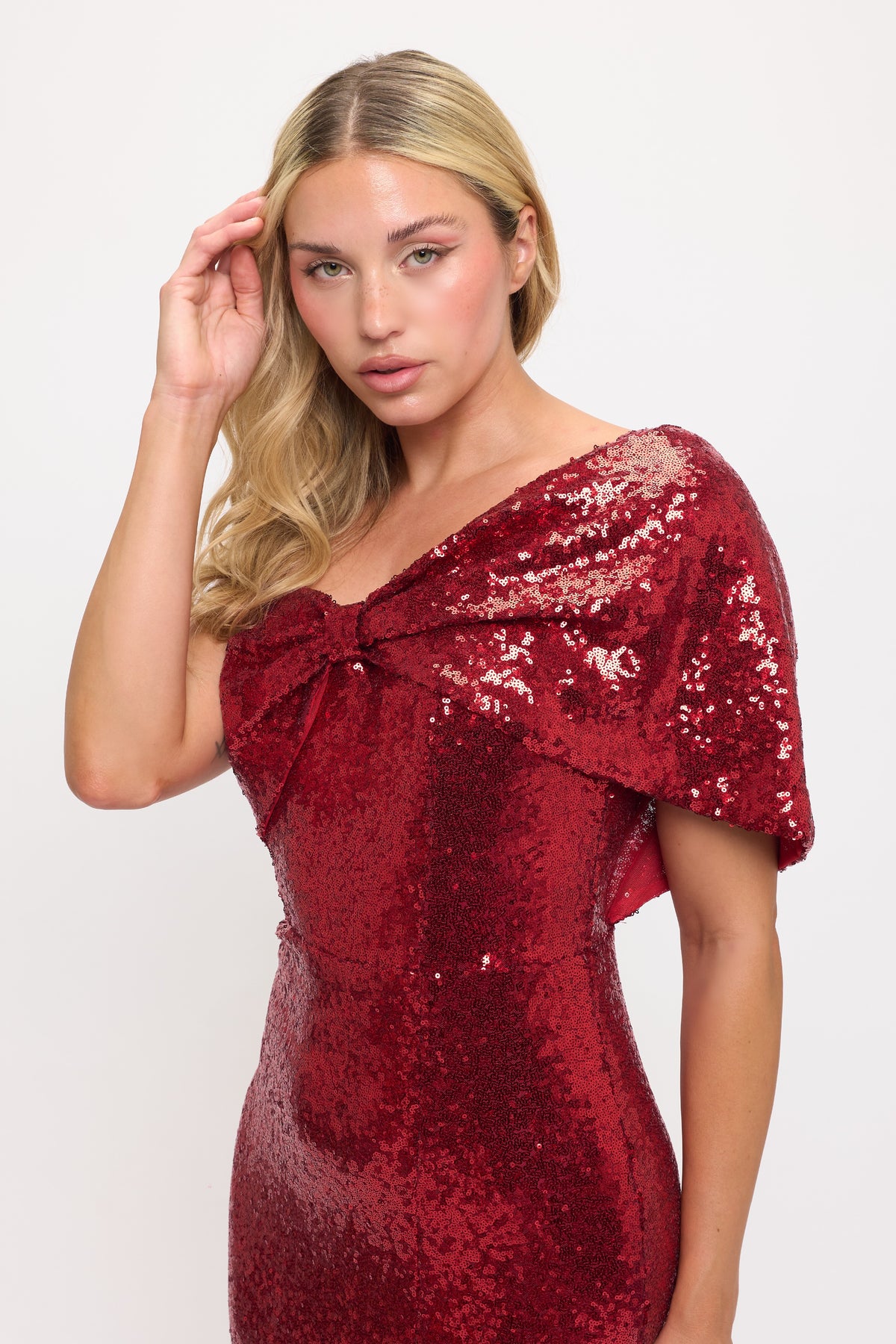 Sparkling sequin one shoulder bow side slit gown