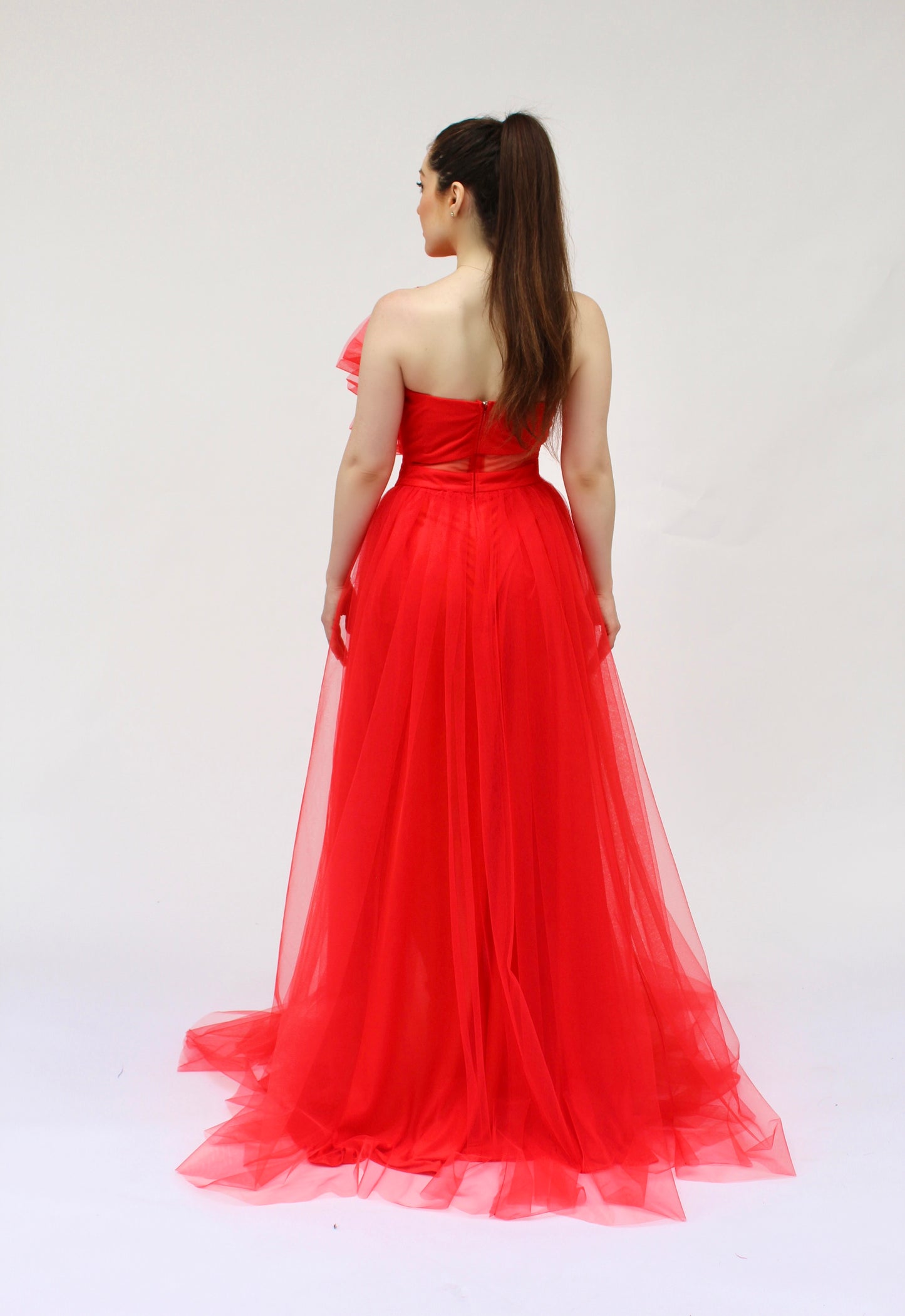 Strapless layered tulle asymmetrical bodice side slit gown