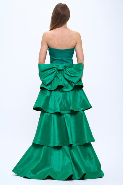 Strapless slit back dress and detachable belted oversized bow ruffle layered train