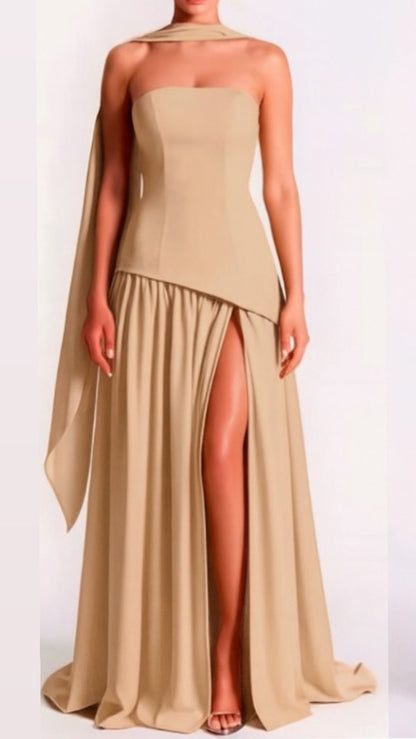 Strapless asymmetrical corset slit gown